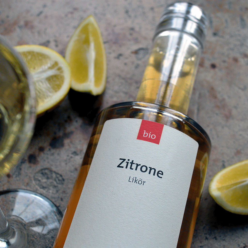 Bio Zitronenlikör (700 ml) mit Bio Zitronen und Glas - Destillerie Farthofer